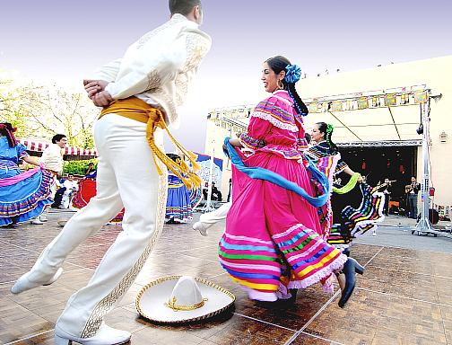 Juan Carlos Chaurand and Whitney Boyd: closest dancers to the camera - performing Jarabe Tapatio (Mexican Hat Dance)