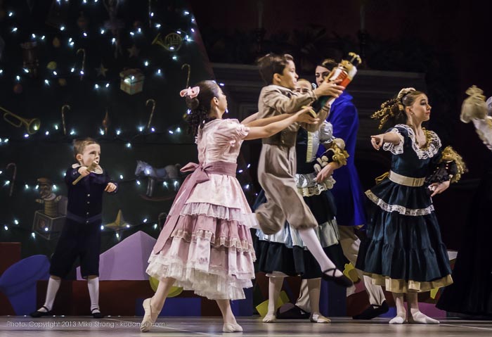 Photo by Mike Strong (kcdance.com) - Fritz (Theo Muhammed) grabs the Nutcracker doll from Clara (Elise Johnson, 2 pm)