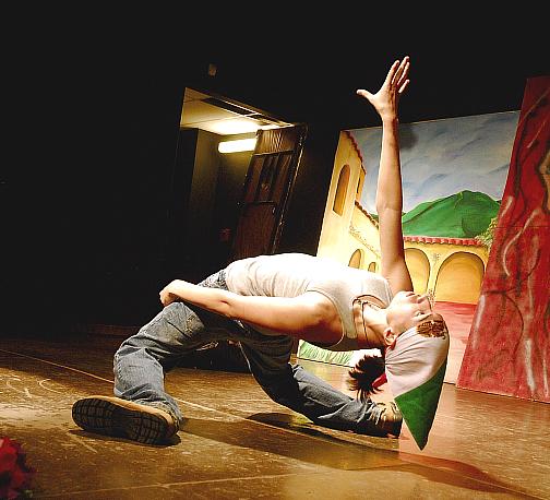 Seto (Aniseto Herrera) krumping in a solo performance at Breaking Piñatas presented by the Latino Writers Collective 17 April 2008. Seto is also a dancer with El Grupo Folklorico Atotonilco