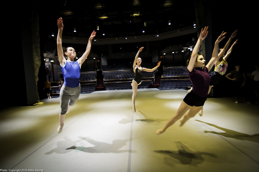 One group doing a tour jete at the 5 pm class on stage before the 7 pm performance - L-R: Rebekah Nelson, Hannah Baillie, Annie Cook