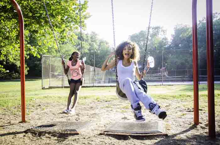 Flavor Pack pair on swings at Dance in the Park 2013