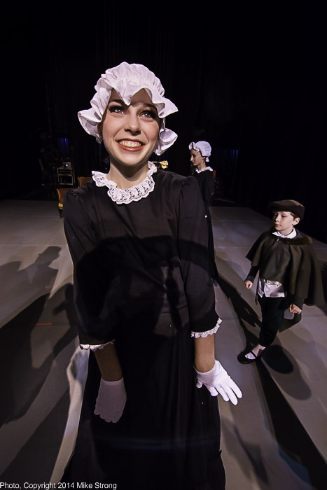 Anne Marie Dahms as maid in Act-I party scene, backstage before performance