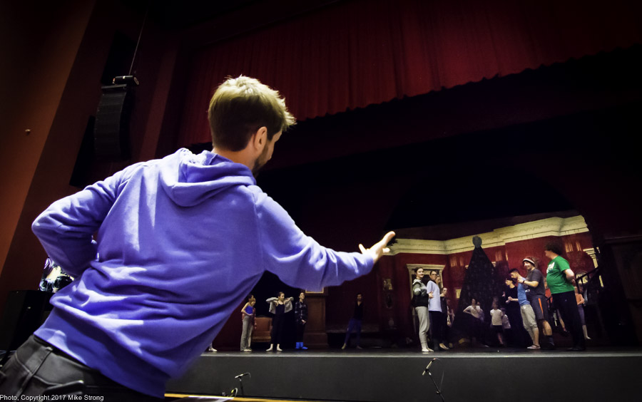 Kristopher Estes-Brown directing the party scene across the orchestra pit - (tech) 