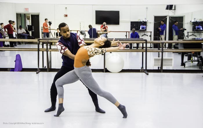 In-studio rehearsal - Maleek Washington and Miyesha McGriff in Heart Thieves by Robert Moses for Wylliams-Henry Contemporary Dance Co. Robert Moses can be seen in the background mirror in seated, blue shirt, just right of center.