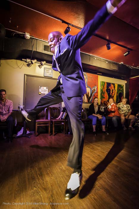 Lonnie McFadden during a tap jam at the Uptown Arts Bar, from in close with ultra-wide angle lens